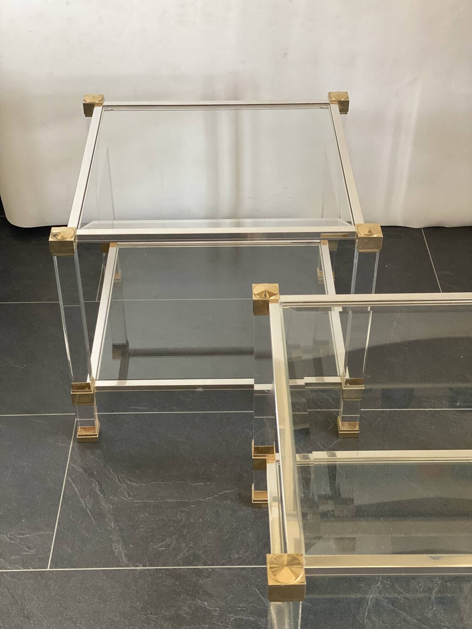 Pair of vintage and brass glass hollywood regency side tables by peter vandel