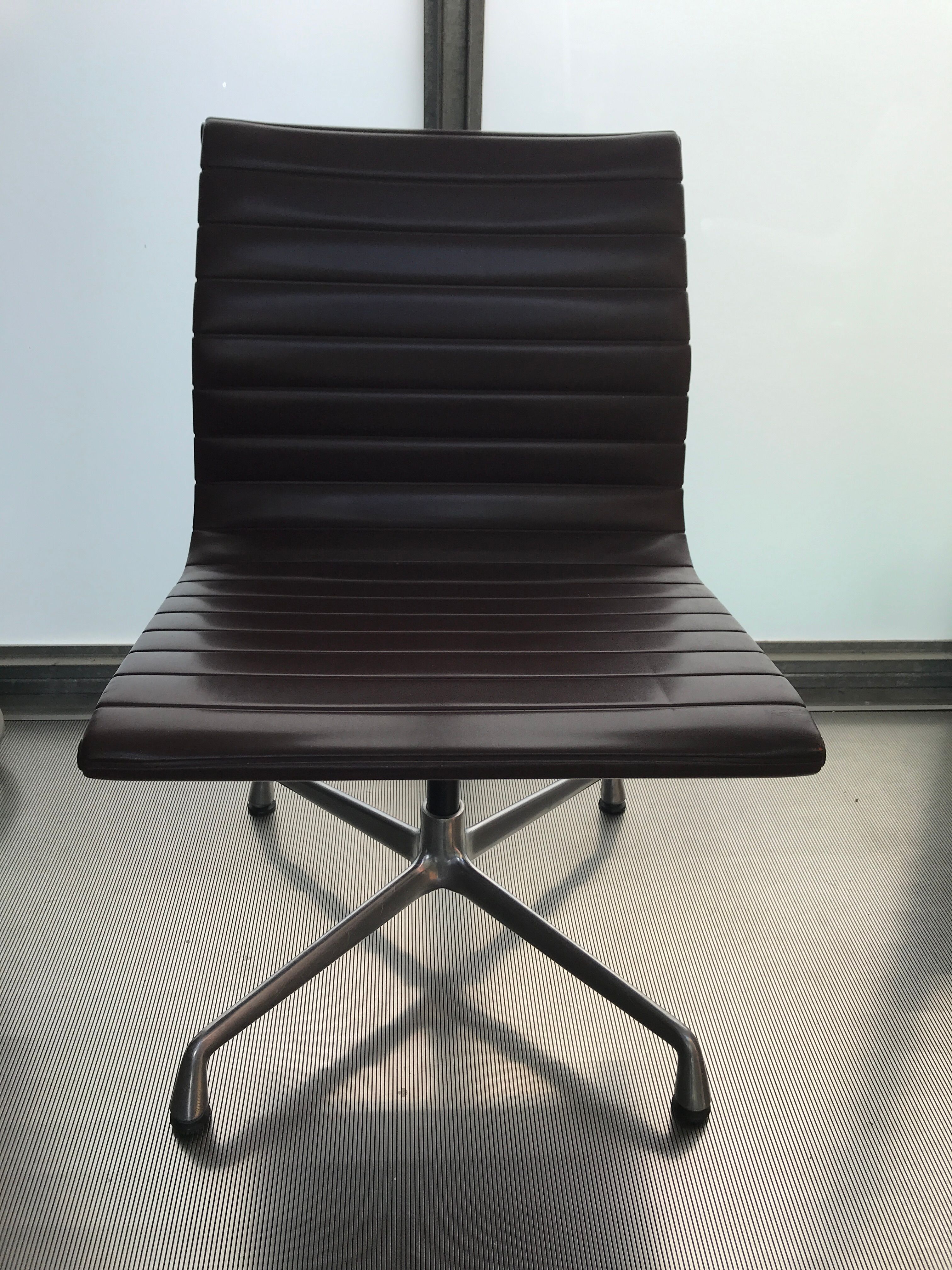 EA107 armchair by Charles and Ray Eames for Vitra