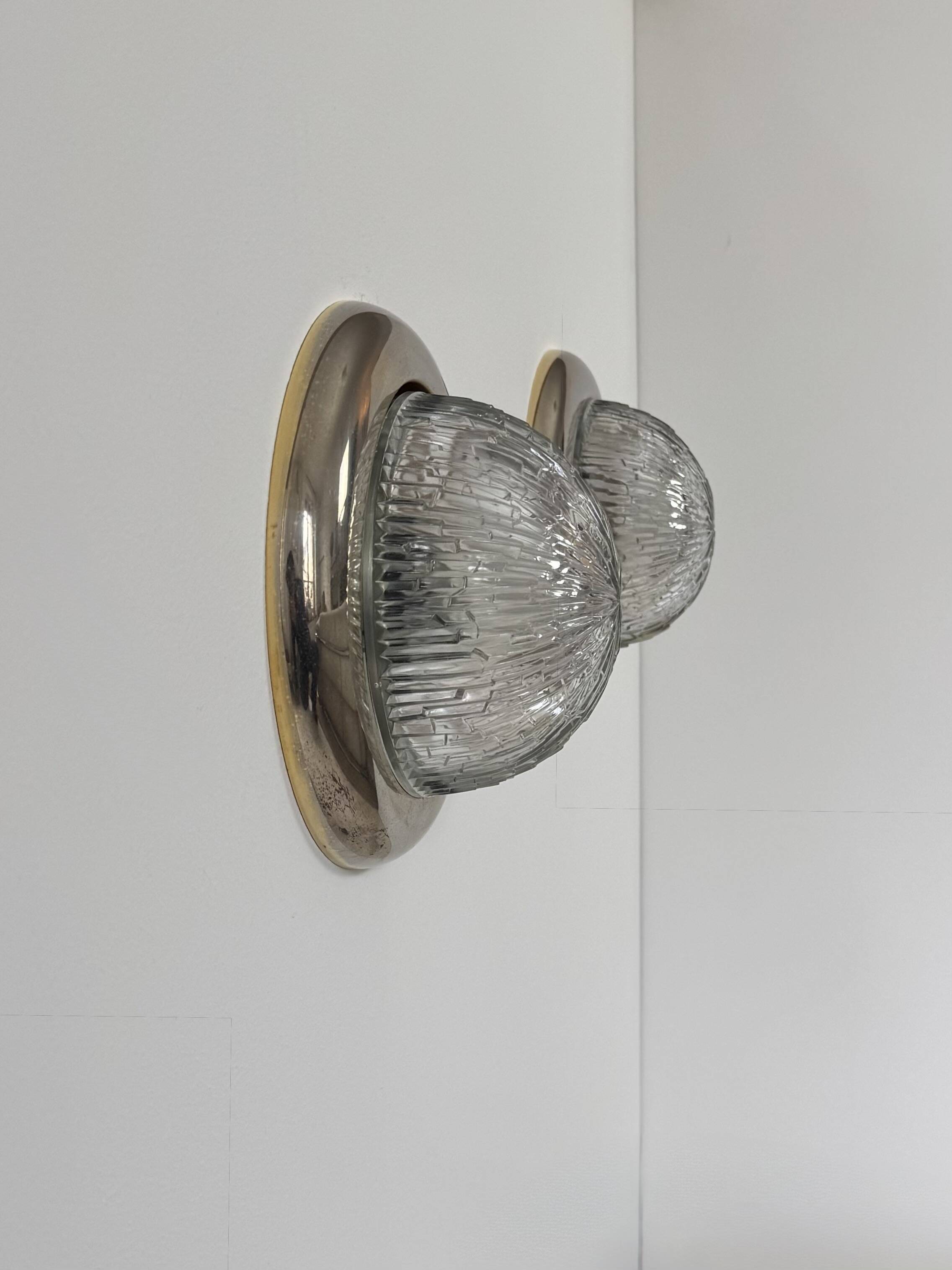 Pair of vintage wall lights, brass and pressed moulded glass, France, 1960.