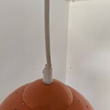 Pair of 70's globes in orange lacquered metal.