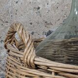 Demijohn with her basket