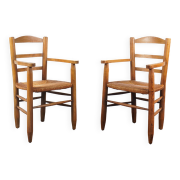 FRENCH WORK in the style of Charlotte Perriand - Pair of armchairs