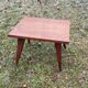 Coffee table of the 50s in blond mahogany inlaid compass feet