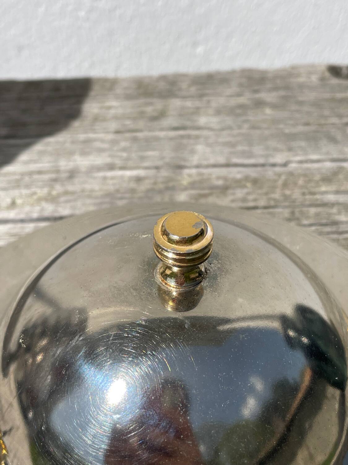 Silver-plated metal butter dish with knots