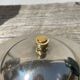 Silver-plated metal butter dish with knots