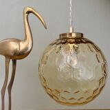 Vintage globe pendant light in amber glass