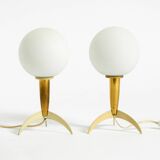 Two Mid-Century Modern rocket table lamps in brass and glass