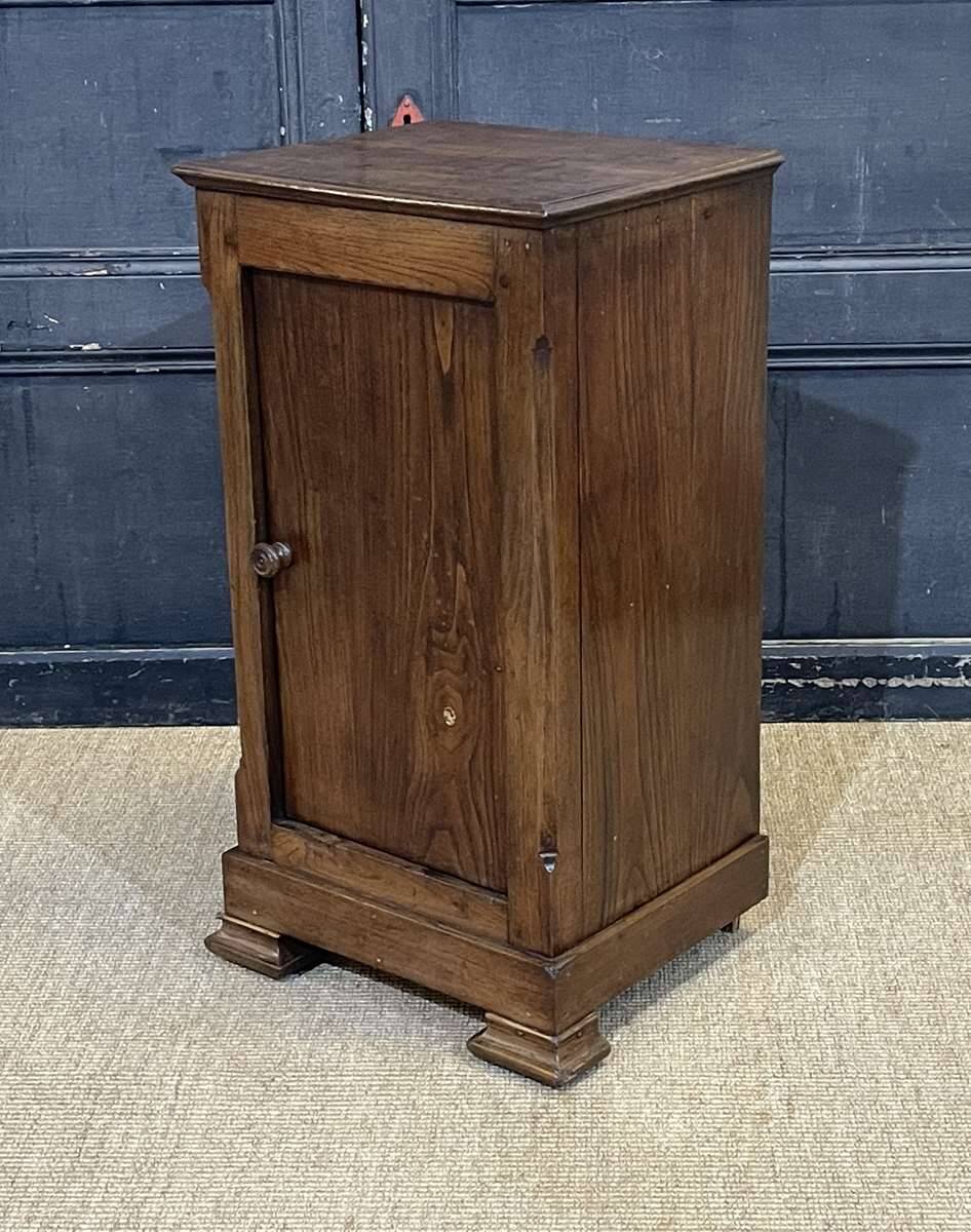 Chestnut bedside table from the early 20th century.