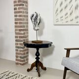 Two-tone black and mahogany pedestal table with mahogany veneer