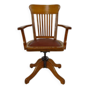 American swivel office armchair in oak, with leather seat, USA, Circa 1900