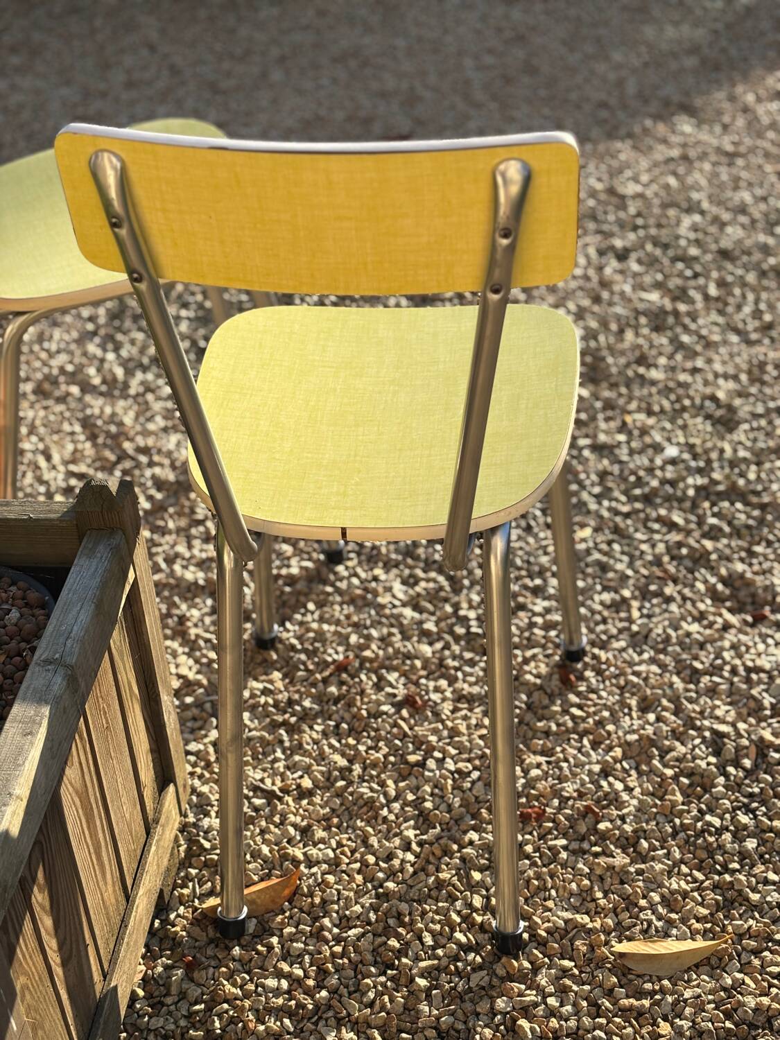 Pair of yellow Formica chairs