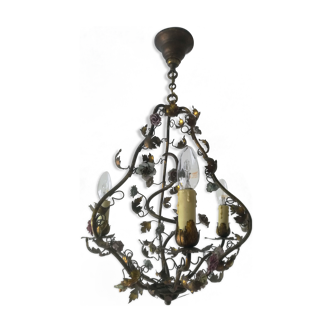 Brass chandelier and porcelain flowers