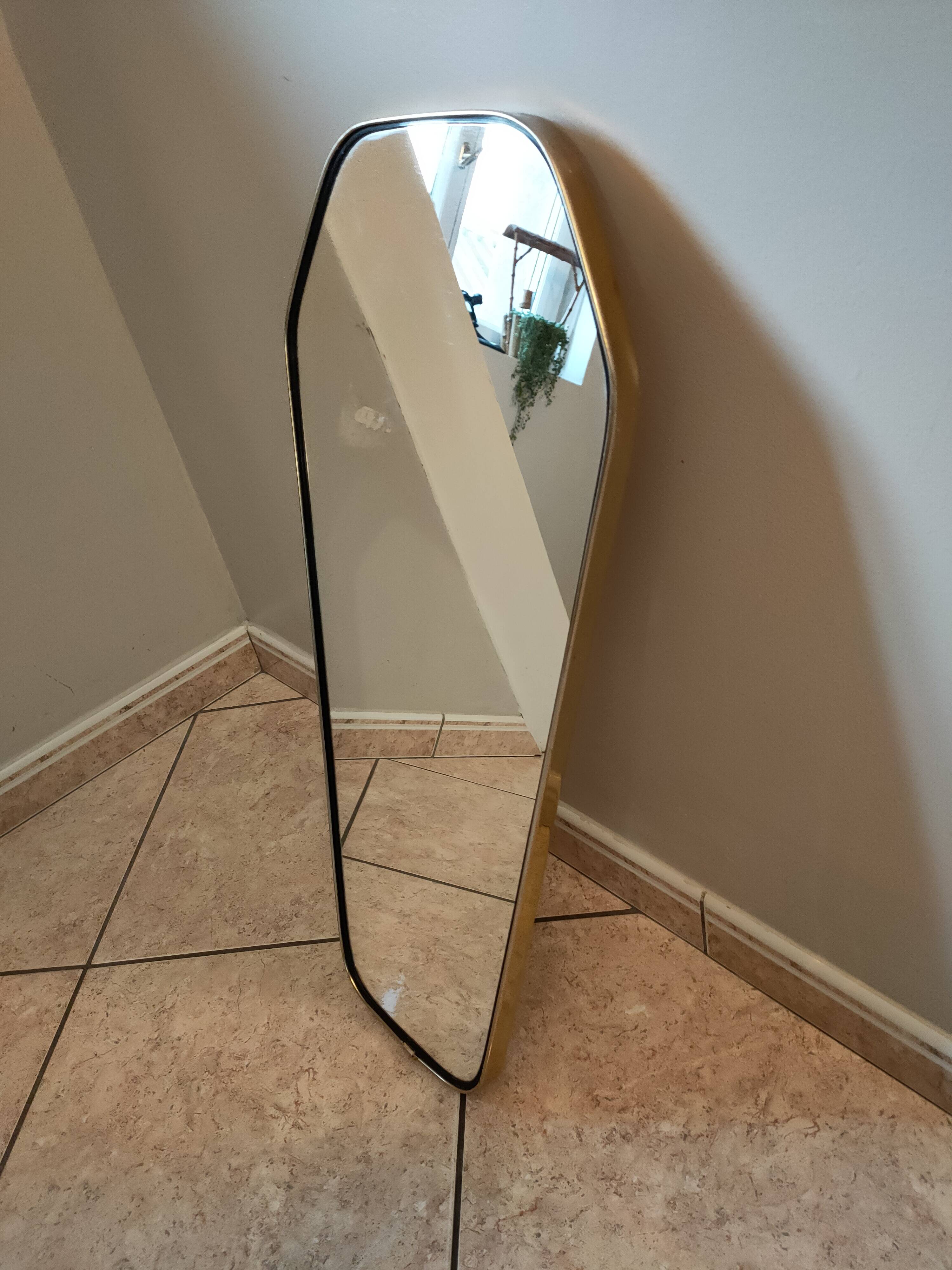 Free-form mirror from the 50s-60s