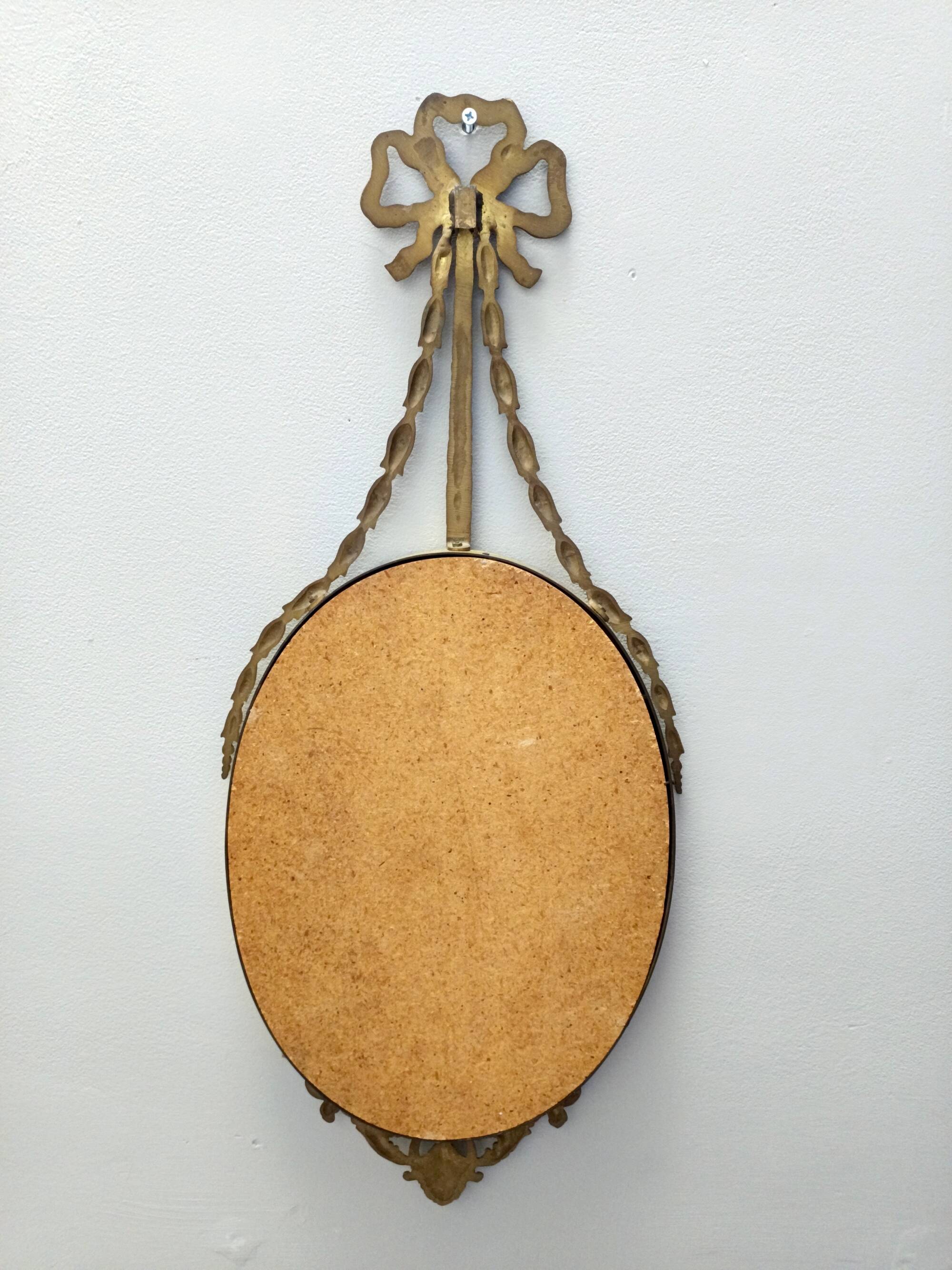 Oval wall mirror with Brass Frame and Ribbon, Italy