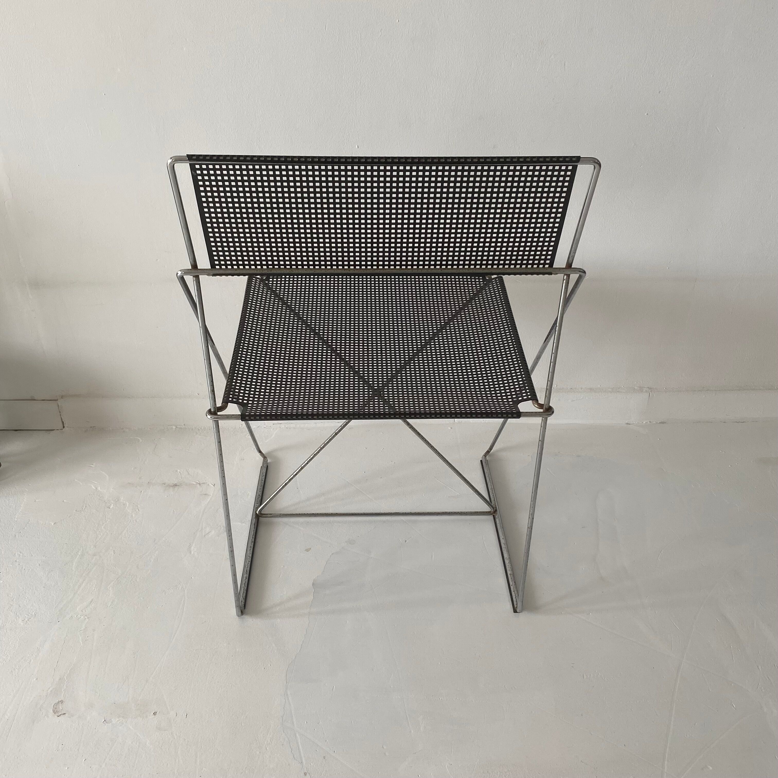 Nuova X line wired chair by Niels Jorgen Haugesen