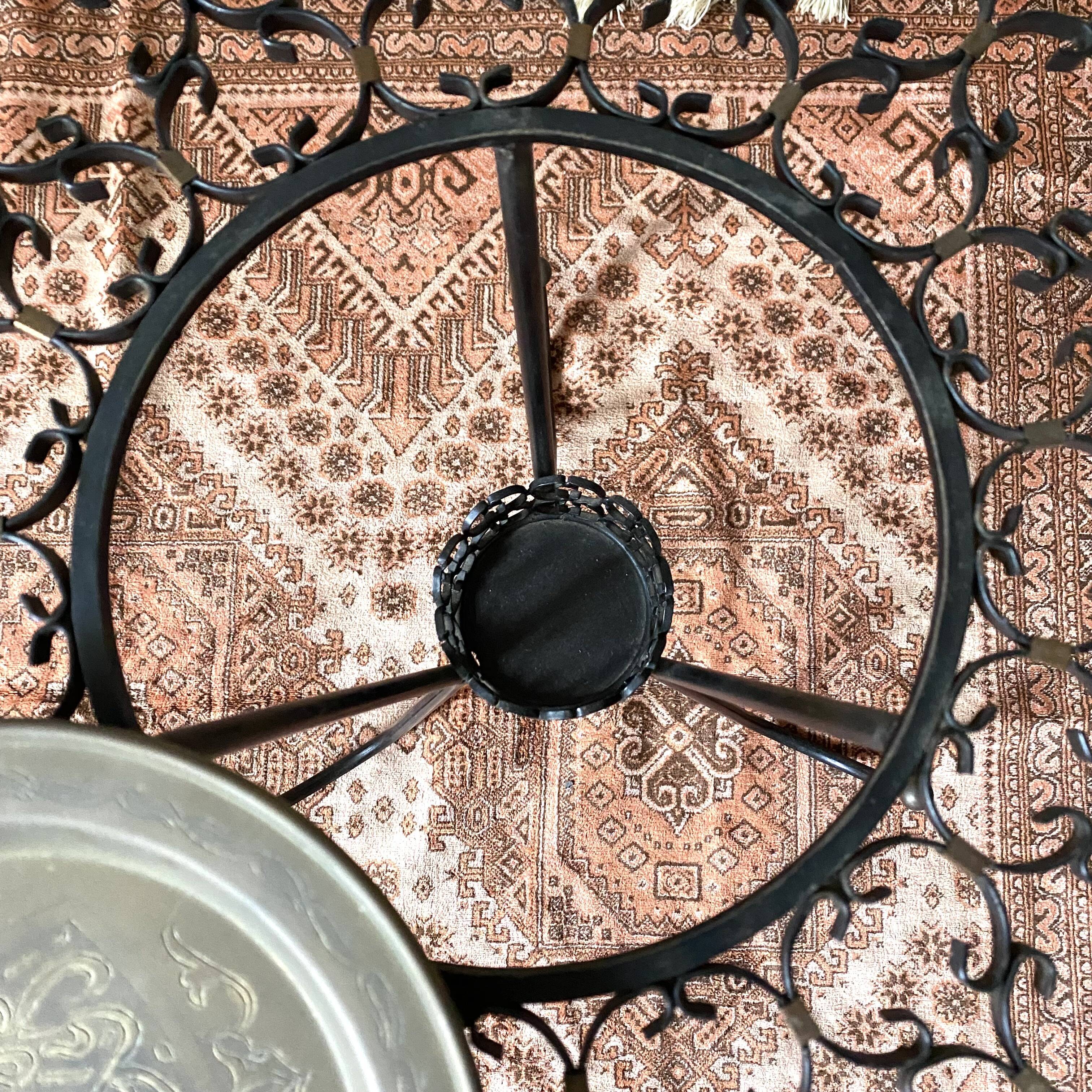 Wrought iron plant holder table from the 1950s