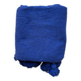 Blue plaid with Moroccan pompoms