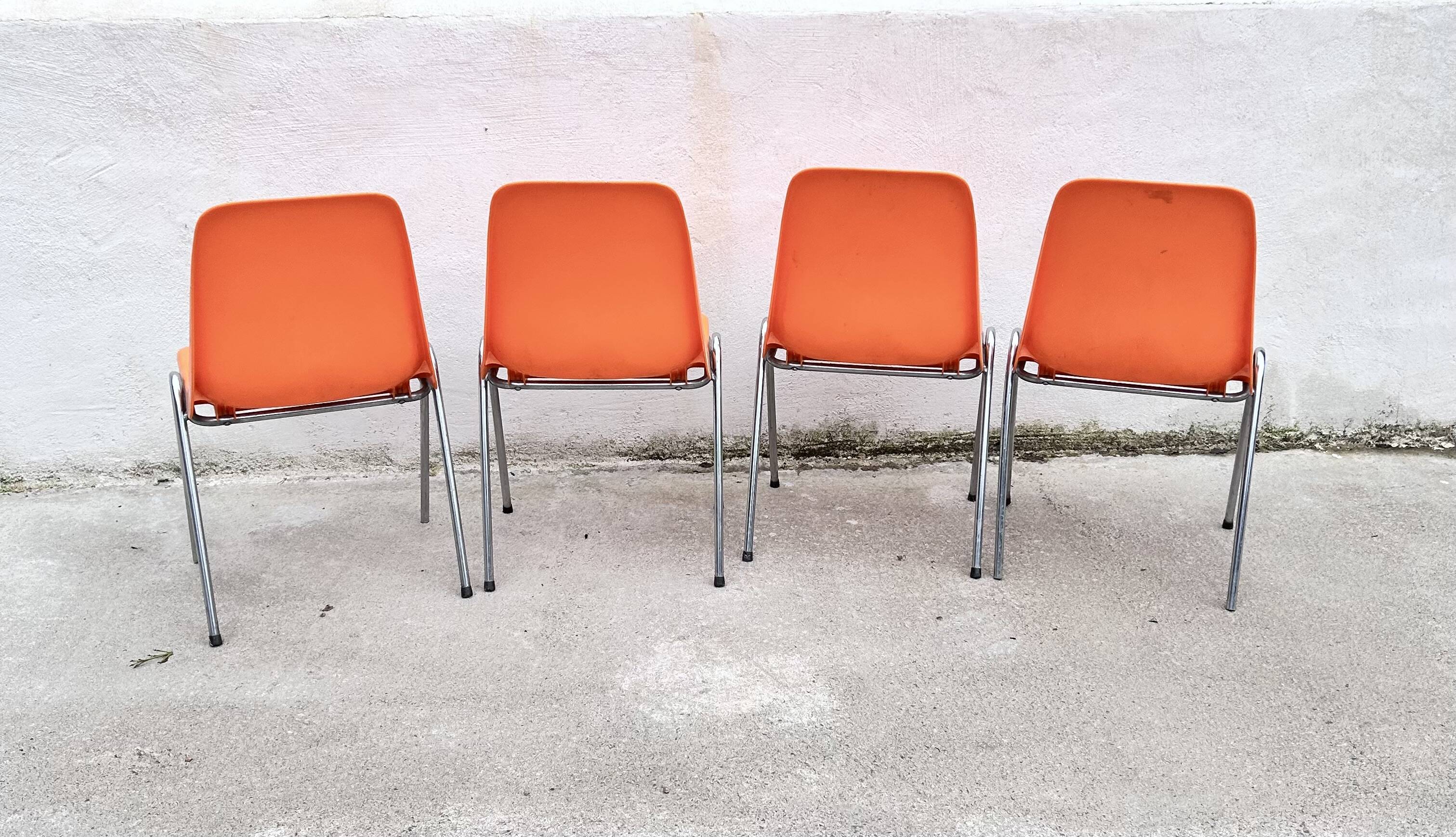 Orange plastic chairs