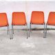 Orange plastic chairs