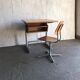 Embru 1960s desk and school chair set in brown wood and grey metal — set of 2