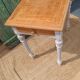 Antique drawer table with a patina.