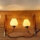 Pair of wood and gilded brass sconces 1950 boat hulls with 2 lights.