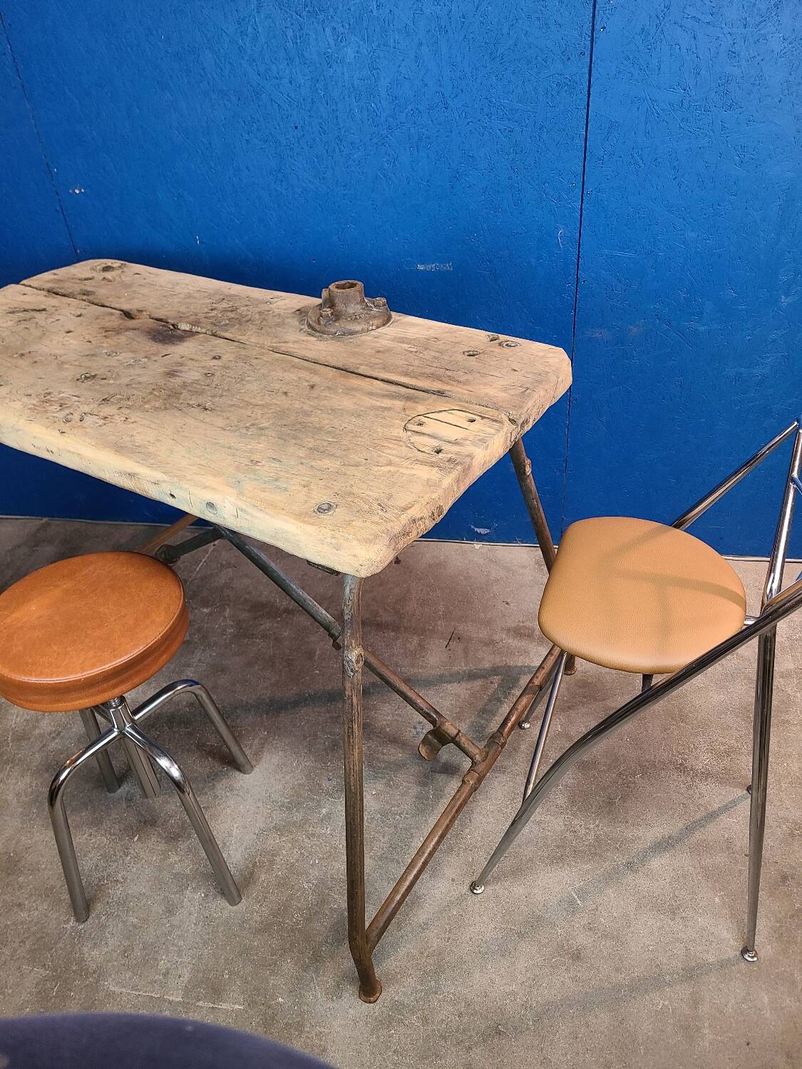 Vintage workbench circa 1930, folding metal leg.