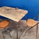 Vintage workbench circa 1930, folding metal leg.