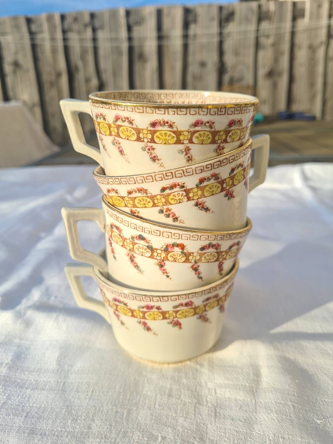 Gien opaque porcelain cups from the early 20th century