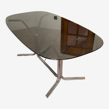 Oval table. 1970. Steel and smoked glass. 180x100