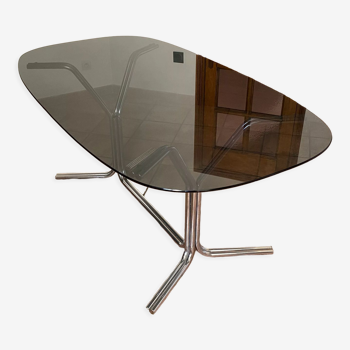 Table ovale. 1970. Acier et verre fumé. 180x100