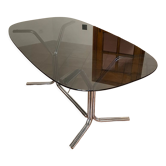 Oval table. 1970. Steel and smoked glass. 180x100