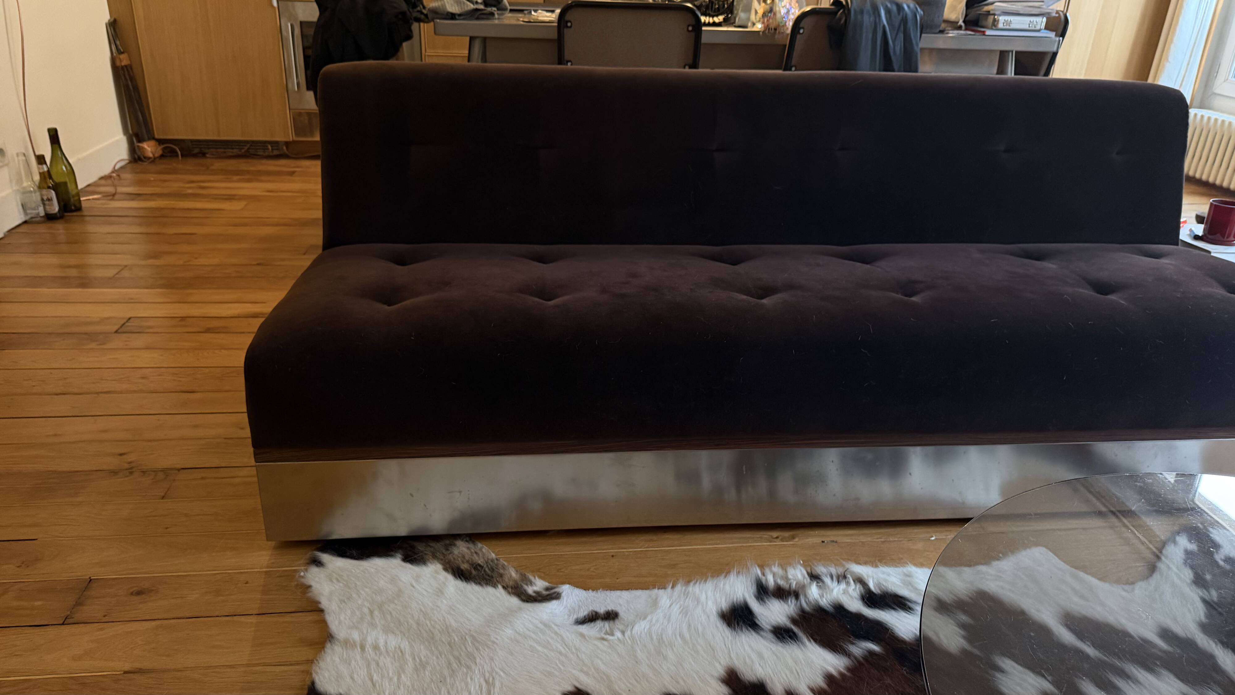 Red Edition Stanley 3-seater sofa with matching chocolate velvet storage.