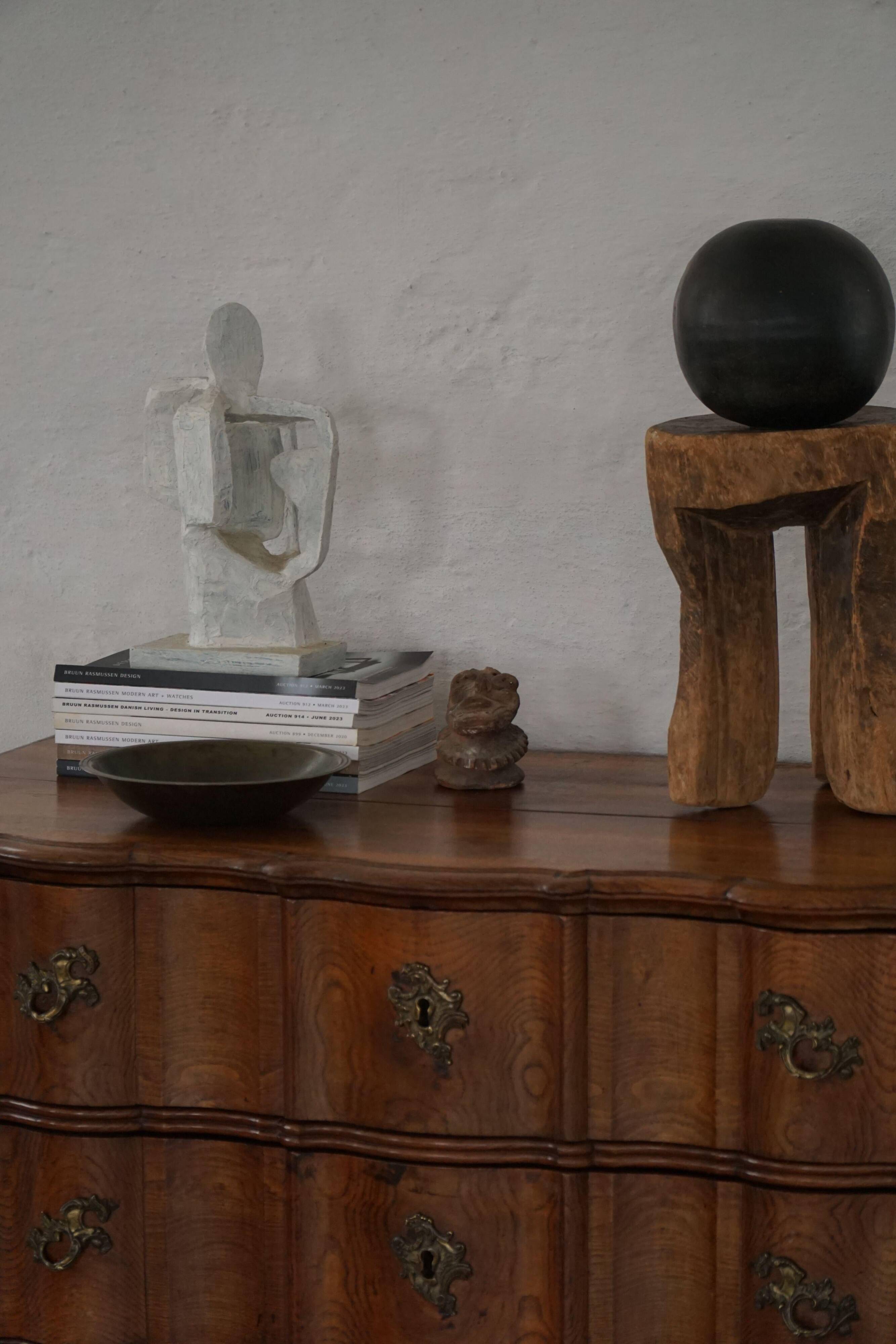 Antique baroque oak commode from the late 18th century with cabriole legs.