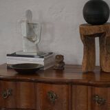 Antique baroque oak commode from the late 18th century with cabriole legs.