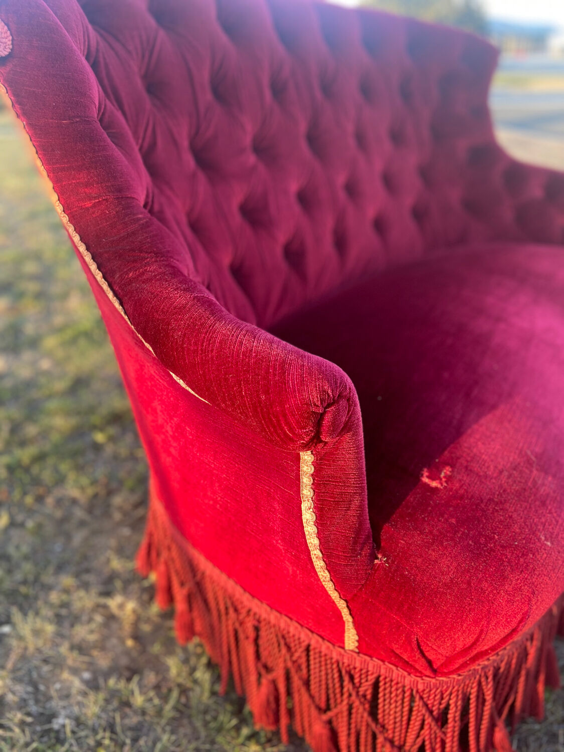 Small old Napoleon III toad sofa in red velvet
