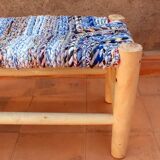 Blue woven and wood bench stool