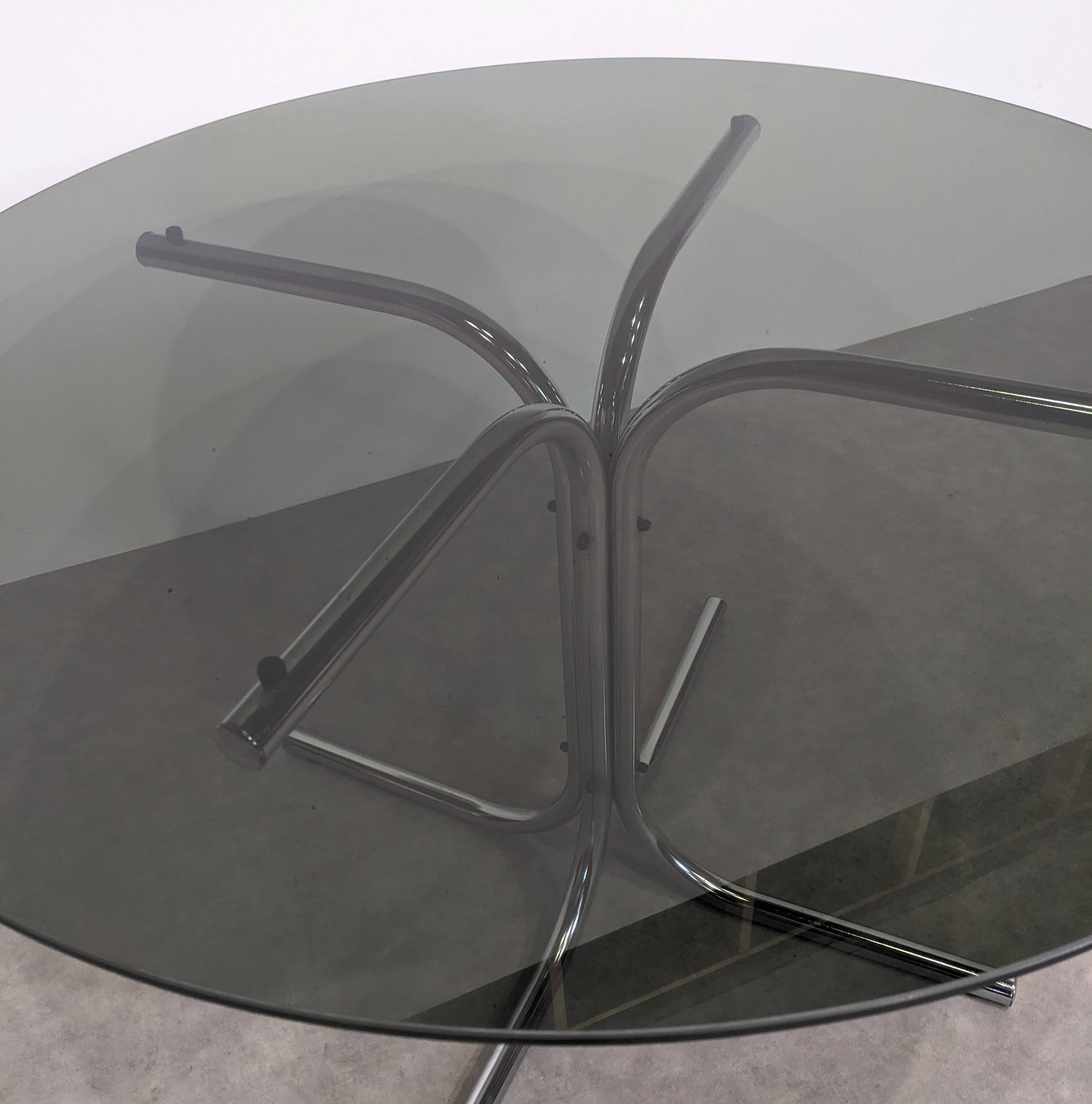 70s round table with smoked glass and chrome