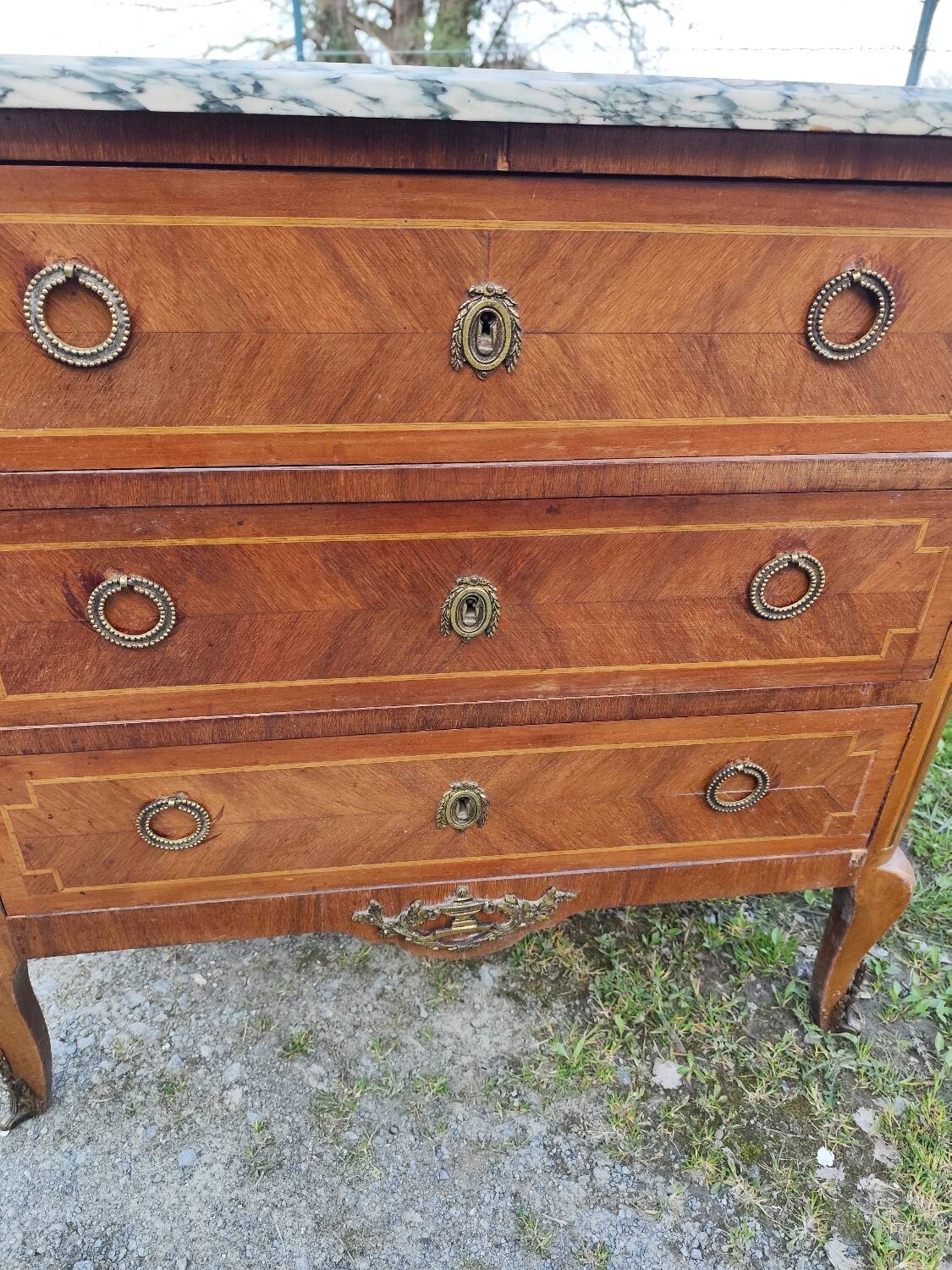 Louis XV, Louis XVI transitional style chest of drawers in marble and wood marquetry