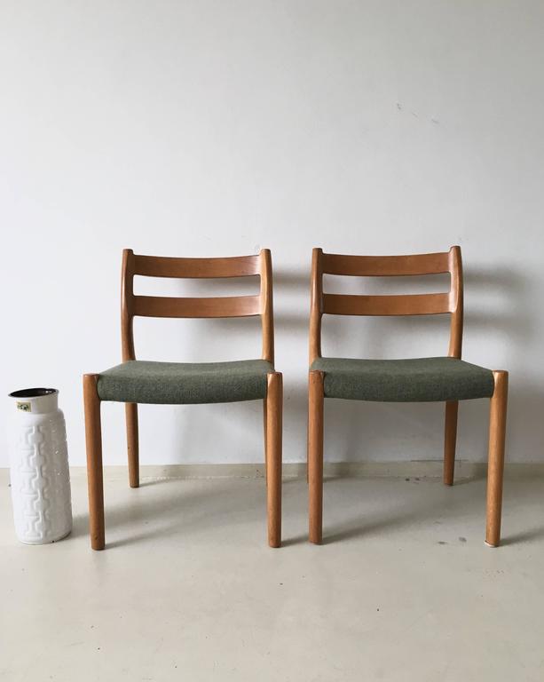 Pair of chairs by JL Moller for Hojbjerg Denmark 1960s teak