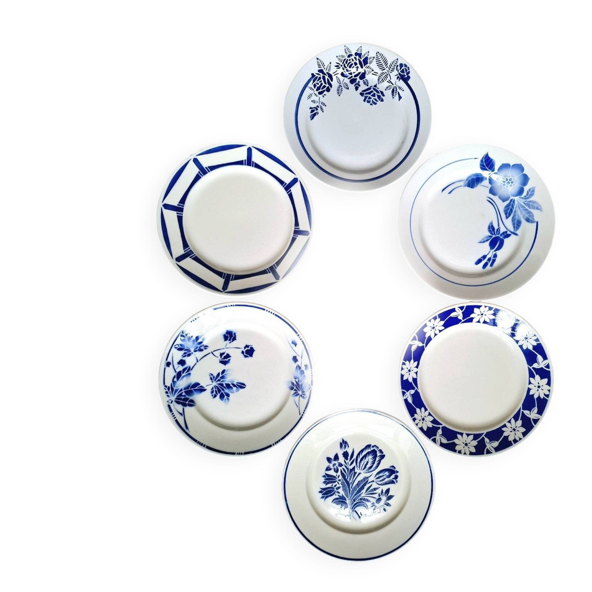 Mismatched antique flat plates in earthenware