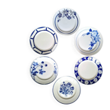 Mismatched antique flat plates in earthenware