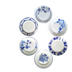 Mismatched antique flat plates in earthenware