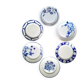 Mismatched antique flat plates in earthenware