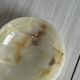 Marbled onyx pocket emptier