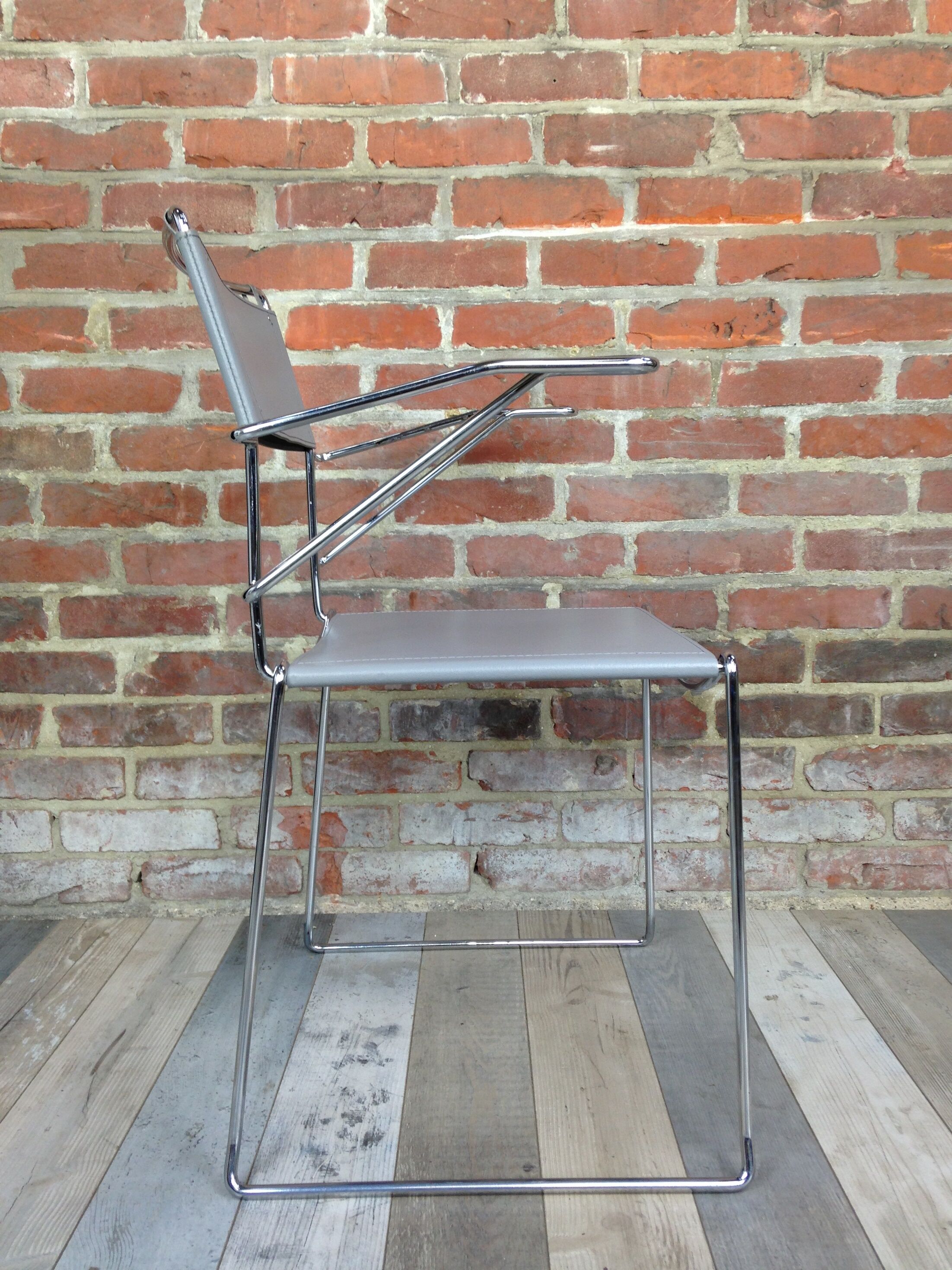 Lot of 4 Italian design chairs in leather and chrome