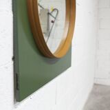 Unusual round wall mirror 60 cm teak edge on green rectangular board 1960.