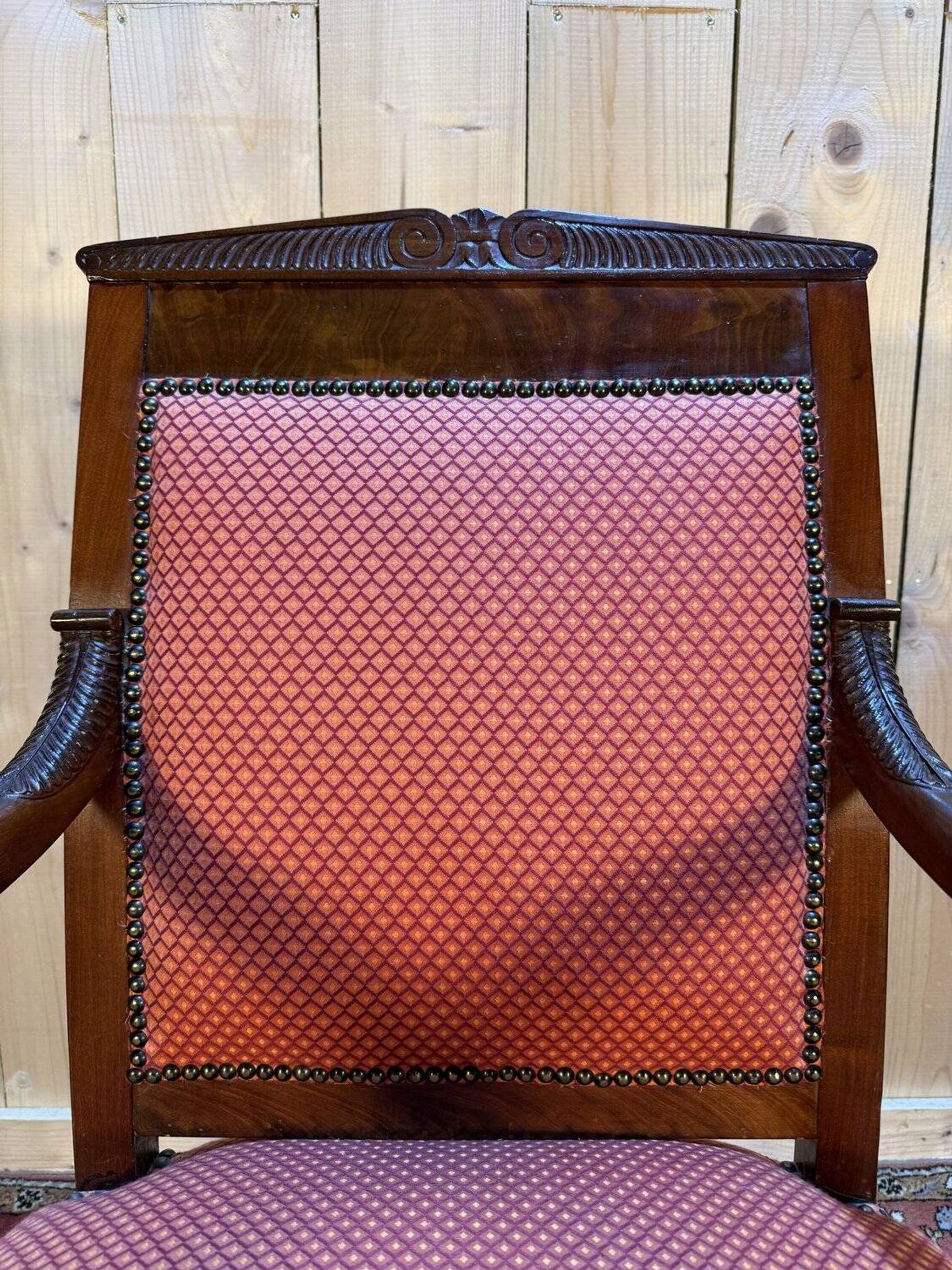 Fauteuil époque Empire en acajou pieds sabres