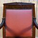 Empire period armchair in mahogany with saber legs.