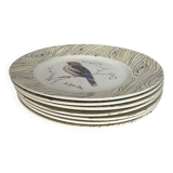 7 antique plates decorated with birds